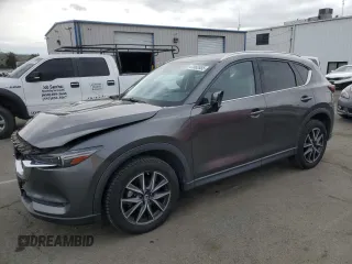 2018 Mazda CX-5 S Premium with VIN JM3KFBDM1J1352233, listed as a Copart auction lot 47082655 with 70,350 mi miles and Salvage Title. Bid and sale history available at DreamBid. Image 1.