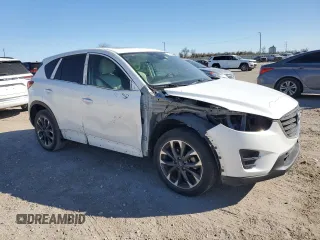 2016 Mazda CX-5 Grand Touring with VIN JM3KE2DY4G0704001, listed as a Copart auction lot 49666445 with 149,000 mi miles and Salvage Title. Bid and sale history available at carsss.com. Image 4.