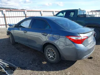 2014 Toyota Corolla L with VIN 5YFBURHE2EP040286, listed as a IAAI auction lot 41890115 with 154,584 mi miles and . Bid and sale history available at DreamBid. Image 3.