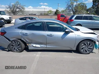 2019 Honda Insight Touring with VIN 19XZE4F93KE007489, listed as a IAAI auction lot 41943334 with 118,689 mi miles and . Bid and sale history available at DreamBid. Image 14.