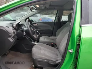 2014 Chevrolet Sonic LT with VIN 1G1JC6SH9E4219906, listed as a Copart auction lot 44125705 with 91,121 mi miles and Salvage Title. Bid and sale history available at carsss.com. Image 7.