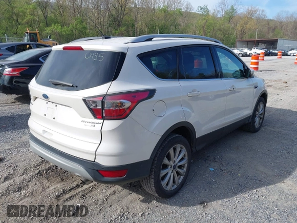 2017 Ford Escape Titanium with VIN 1FMCU9JD9HUB40135, listed as a IAAI auction lot 42054533 with 68,255 mi miles. Bid and sale history available at carsss.com. Image 4.
