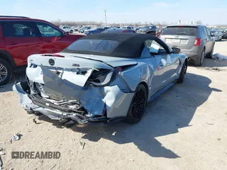 2024 BMW M4 Competition xDrive with VIN WBS33BA08RCP12582, listed as a IAAI auction lot 41646042 with 2,884 mi miles. Bid and sale history available at carsss.com. Image 4.