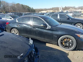 2014 Infiniti Q50 Hybrid Sport with VIN JN1AV7AP9EM691834, listed as a IAAI auction lot 41703454 with Not Provided miles and . Bid and sale history available at DreamBid. Image 12.