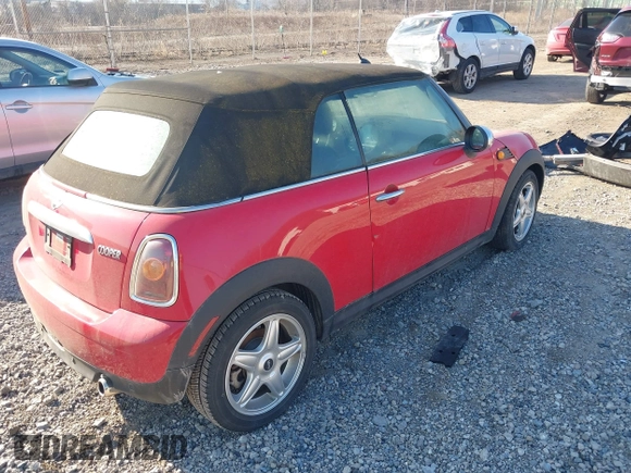 2010 MINI Convertible with VIN WMWMR3C59ATU97398, listed as a IAAI auction lot 41714054 with 12,663 mi miles and . Bid and sale history available at DreamBid. Image 4.
