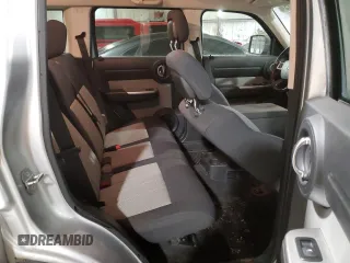 2010 Dodge Nitro SXT z VIN 1D4PU5GK7AW112562, wystawiony jako Copart lot #45113225 z przebiegiem 150 183 mil mil oraz Szkoda całkowita • Salvage title. Historia ofert i sprzedaży dostępna na DreamBid. Obrazek 11.