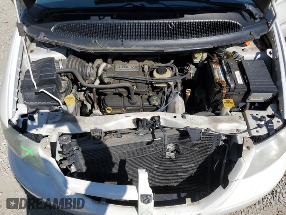 2005 Dodge Caravan SXT with VIN 2D4GP44L55R331470, listed as a Copart auction lot 53113855 with 98,398 mi miles and Salvage title. Bid and sale history available at DreamBid. Image 12.