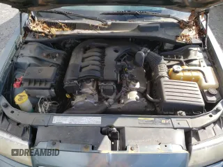2006 Chrysler 300 Touring z VIN 2C3KA53G66H405462, wystawiony jako Copart lot #55913485 z przebiegiem 138 369 mil mil oraz Szkoda całkowita • Salvage title. Historia ofert i sprzedaży dostępna na DreamBid. Obrazek 11.