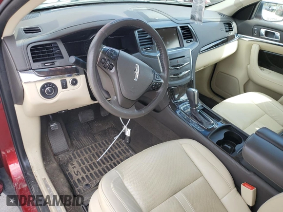 2013 Lincoln MKS EcoBoost with VIN 1LNHL9FT1DG609011, listed as a Copart auction lot 55793575 with Not provided miles and Salvage title. Bid and sale history available at DreamBid. Image 8.