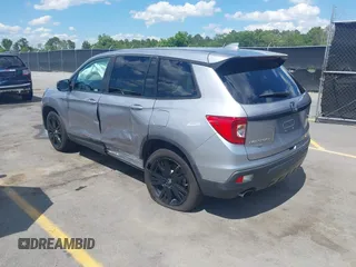 2021 Honda Passport Sport with VIN 5FNYF7H27MB003467, listed as a IAAI auction lot 42183219 with 52,156 mi miles and . Bid and sale history available at DreamBid. Image 3.
