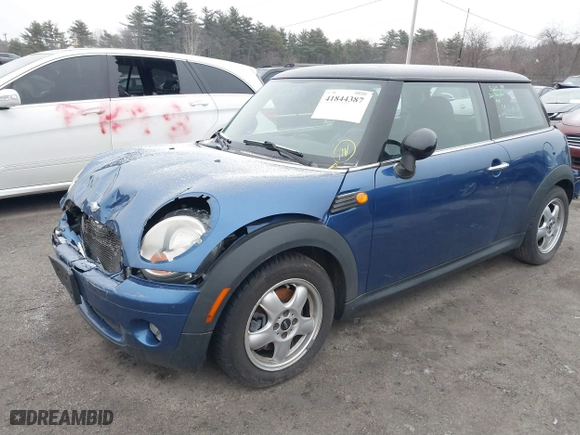 2009 MINI Cooper Hardtop with VIN WMWMF33579TW72543, listed as a IAAI auction lot 41844387 with 125,835 mi miles. Bid and sale history available at carsss.com. Image 2.