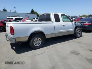 2000 Ford F-150 XL with VIN 1FTRX17W9YKA49152, listed as a Copart auction lot 60577505 with Not provided miles and Salvage title. Bid and sale history available at DreamBid. Image 3.