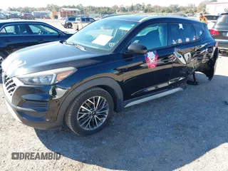 2019 Hyundai Tucson Sport with VIN KM8J33AL5KU902933, listed as a IAAI auction lot 41286316 with 73,799 mi miles. Bid and sale history available at carsss.com. Image 18.