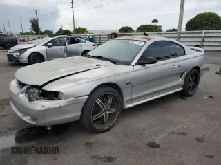 1998 Ford Mustang GT with VIN 1FAFP42XXWF229613, listed as a Copart auction lot 63231905 with 65,669 mi miles and Salvage title. Bid and sale history available at DreamBid. Image 1.