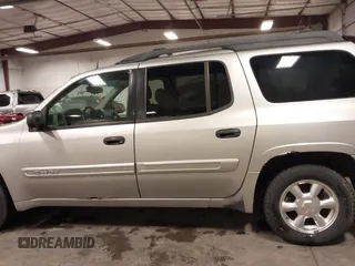 2005 GMC Envoy SLE with VIN 1GKET16S656102522, listed as a IAAI auction lot 41729310 with 233,049 mi miles. Bid and sale history available at carsss.com. Image 15.