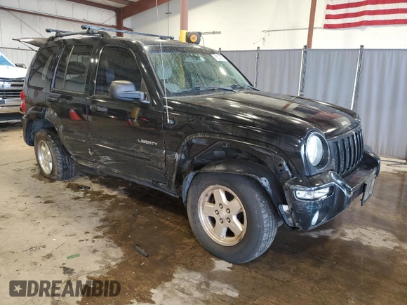 2004 Jeep Liberty Limited with VIN 1J4GK58K24W325483, listed as a Copart auction lot 62526335 with 130,862 mi miles and Salvage title. Bid and sale history available at DreamBid. Image 4.