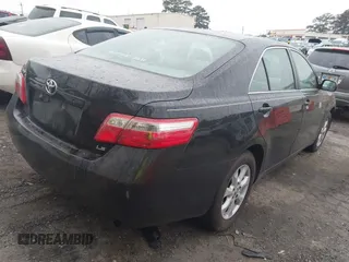 2007 Toyota Camry CE z VIN 4T1BE46KX7U587204, wystawiony jako IAAI lot #41923778 z przebiegiem 144 996 mil mil oraz . Historia ofert i sprzedaży dostępna na DreamBid. Obrazek 4.
