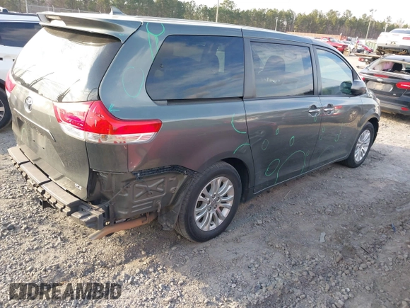2012 Toyota Sienna XLE AAS with VIN 5TDYK3DC7CS276681, listed as a IAAI auction lot 41520303 with 183,511 mi miles and . Bid and sale history available at DreamBid. Image 4.