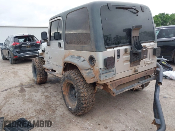 2004 Jeep Wrangler X with VIN 1J4FA39S24P701806, listed as a IAAI auction lot 42218100 with 72,757 mi miles and . Bid and sale history available at DreamBid. Image 3.