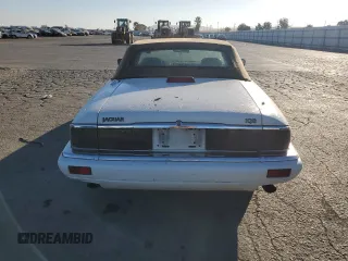 1995 Jaguar XJS with VIN SAJNX2741SC199729, listed as a Copart auction lot 76290164 with 199,627 mi miles and Clean Title. Bid and sale history available at carsss.com. Image 6.