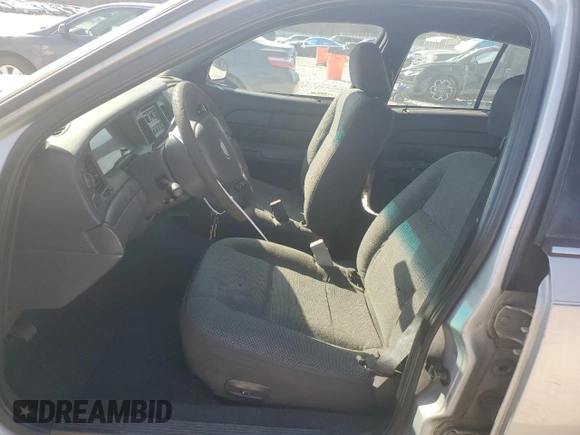 2003 Ford Police Interceptor Street Appear with VIN 2FAFP71W33X109470, listed as a Copart auction lot 46928115 with 239,164 mi miles and Salvage title. Bid and sale history available at DreamBid. Image 7.