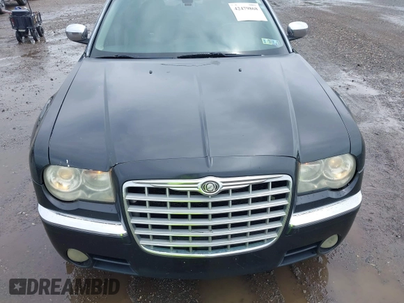2006 Chrysler 300 C z VIN 2C3LA63H66H412270, wystawiony jako IAAI lot #42479868 z przebiegiem 143 476 mil mil oraz . Historia ofert i sprzedaży dostępna na DreamBid. Obrazek 12.