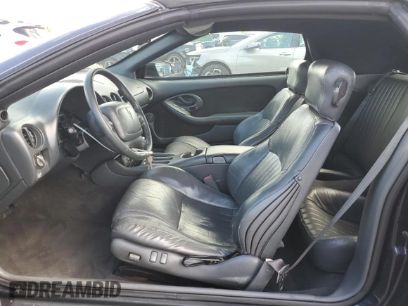 1999 Pontiac Firebird Trans Am with VIN 2G2FV32GXX2229175, listed as a Copart auction lot 65678225 with 180,298 mi miles and Salvage title. Bid and sale history available at DreamBid. Image 7.