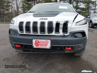 2016 Jeep Cherokee Trailhawk with VIN 1C4PJMBS7GW241076, listed as a IAAI auction lot 42020124 with 151,742 mi miles and . Bid and sale history available at DreamBid. Image 6.