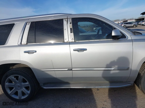 2015 Cadillac Escalade Luxury with VIN 1GYS4BKJ1FR300806, listed as a IAAI auction lot 41816789 with 131,457 mi miles. Bid and sale history available at carsss.com. Image 13.