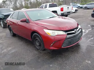 2015 Toyota Camry XLE with VIN 4T1BF1FK2FU982570, listed as a IAAI auction lot 41629755 with 245,224 mi miles. Bid and sale history available at carsss.com. Image 1.