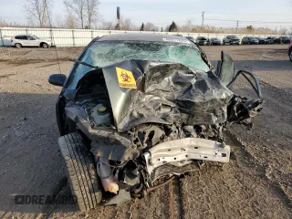 2000 Saturn SL with VIN 1G8ZK527XYZ259766, listed as a Copart auction lot 48911825 with Not provided miles and Salvage title. Bid and sale history available at DreamBid. Image 5.