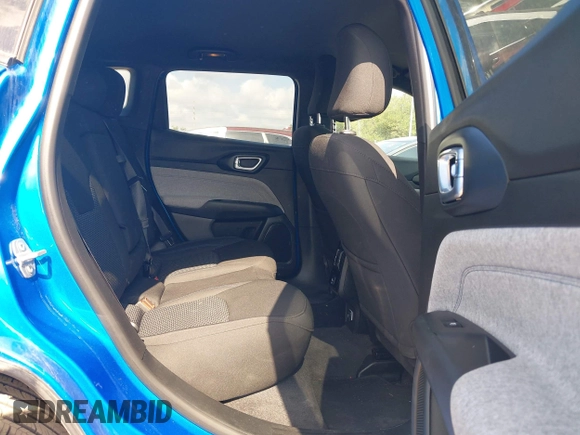 2023 Jeep Compass Sport with VIN 3C4NJDAN1PT509922, listed as a IAAI auction lot 42327048 with 26,598 mi miles and . Bid and sale history available at DreamBid. Image 8.