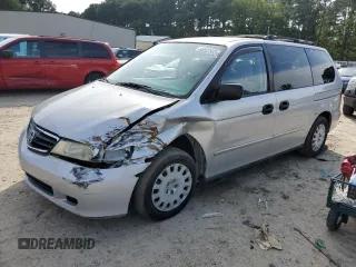 2003 Honda Odyssey LX z VIN 5FNRL18574B120258, wystawiony jako Copart lot #65502593 z przebiegiem 146 664 mil mil oraz Nie do naprawy • Non repairable. Historia ofert i sprzedaży dostępna na DreamBid. Obrazek 1.