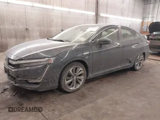 2018 Honda Clarity Touring z VIN JHMZC5F39JC002521, wystawiony jako IAAI lot #41428968 z przebiegiem 64 014 mil mil oraz . Historia ofert i sprzedaży dostępna na DreamBid. Obrazek 2.