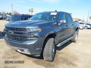 2020 Chevrolet Silverado 1500 LT Trail Boss with VIN 3GCPYFEDXLG148856, listed as a IAAI auction lot 41542925 with 131,119 mi miles. Bid and sale history available at carsss.com. Image 2.