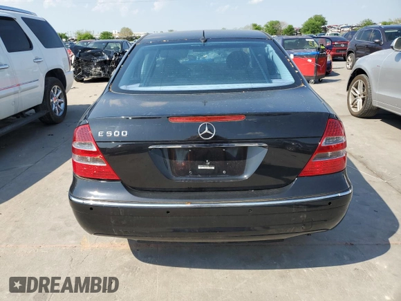 2004 Mercedes-Benz E-Class 5.0L with VIN WDBUF70J14A457996, listed as a Copart auction lot 46591504 with 146,769 mi miles and Salvage Title. Bid and sale history available at carsss.com. Image 6.