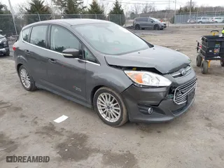 2015 Ford C-Max Energi SEL with VIN 1FADP5CU7FL121209, listed as a IAAI auction lot 41621034 with 145,648 mi miles. Bid and sale history available at carsss.com. Image 1.