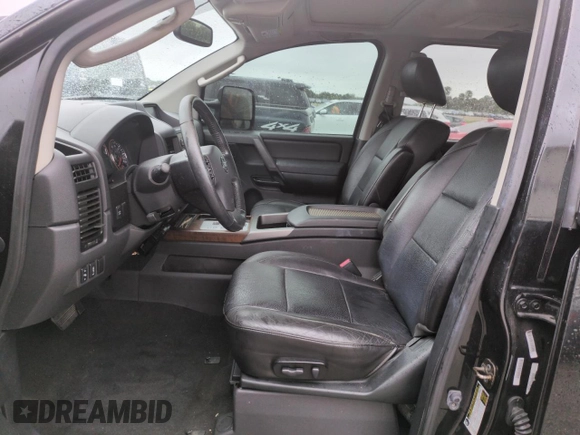 2010 Nissan Titan LE with VIN 1N6BA0EC8AN318538, listed as a Copart auction lot 74122194 with Not Provided miles and Salvage Title. Bid and sale history available at carsss.com. Image 7.