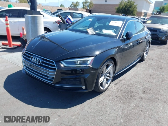 2018 Audi A5 Sportback Premium Plus z VIN WAUENCF55JA009202, wystawiony jako IAAI lot #42218463 z przebiegiem 51 866 mil mil oraz . Historia ofert i sprzedaży dostępna na DreamBid. Obrazek 19.