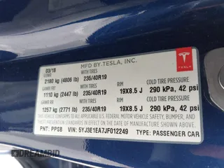 2018 Tesla Model 3 Long Range Battery with VIN 5YJ3E1EA7JF012249, listed as a IAAI auction lot 41782972 with 103,412 mi miles. Bid and sale history available at carsss.com. Image 9.