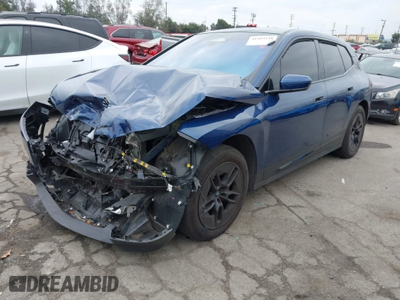 2024 BMW iX xDrive50 z VIN WB523CF05RCN71984, wystawiony jako IAAI lot #41469238 z przebiegiem 45 447 mil mil oraz . Historia ofert i sprzedaży dostępna na DreamBid. Obrazek 17.
