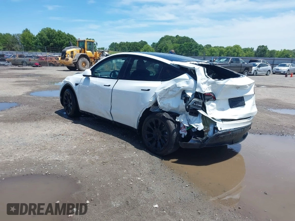 2023 Tesla Model Y Long Range z VIN 7SAYGDEE9PF753051, wystawiony jako IAAI lot #39615839 z przebiegiem Nie podano mil oraz . Historia ofert i sprzedaży dostępna na DreamBid. Obrazek 3.