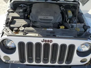 2015 Jeep Wrangler Unlimited Sahara with VIN 1C4BJWEG6FL614671, listed as a Copart auction lot 86052284 with 92,894 mi miles and Salvage title. Bid and sale history available at DreamBid. Image 13.