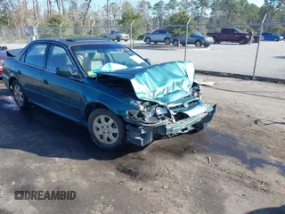 2002 Honda Accord EX z VIN JHMCG56652C022187, wystawiony jako IAAI lot #41282283 z przebiegiem 147 382 mil mil oraz . Historia ofert i sprzedaży dostępna na DreamBid. Obrazek 1.