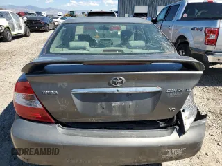 2003 Toyota Camry LE z VIN 4T1BF32K93U566965, wystawiony jako Copart lot #71979144 z przebiegiem 267 228 mil mil oraz Szkoda całkowita • Salvage title. Historia ofert i sprzedaży dostępna na DreamBid. Obrazek 6.