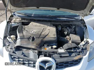 2009 Mazda CX-7 Sport with VIN JM3ER293390218961, listed as a IAAI auction lot 42030907 with 193,573 mi miles. Bid and sale history available at carsss.com. Image 10.