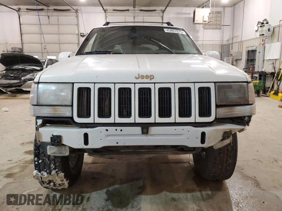 1997 Jeep Grand Cherokee Limited with VIN 1J4GZ78Y5VC747553, listed as a Copart auction lot 49125085 with 0 mi miles and Salvage Title. Bid and sale history available at carsss.com. Image 5.