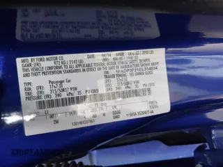 2014 Ford Focus SE with VIN 1FADP3F21EL314534, listed as a IAAI auction lot 42130032 with 103,866 mi miles. Bid and sale history available at carsss.com. Image 9.