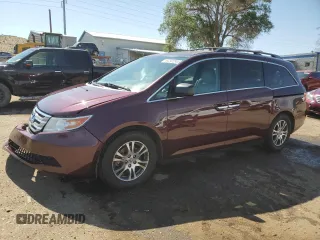 2013 Honda Odyssey EX-L with VIN 5FNRL5H60DB058623, listed as a Copart auction lot 60882865 with 168,726 mi miles and Salvage title. Bid and sale history available at DreamBid. Image 1.