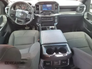 2023 Ford F-150 XL z VIN 1FTEW1CPXPKD71149, wystawiony jako Copart lot #62323775 z przebiegiem 26 664 mil mil oraz Szkoda całkowita • Salvage title. Historia ofert i sprzedaży dostępna na DreamBid. Obrazek 8.